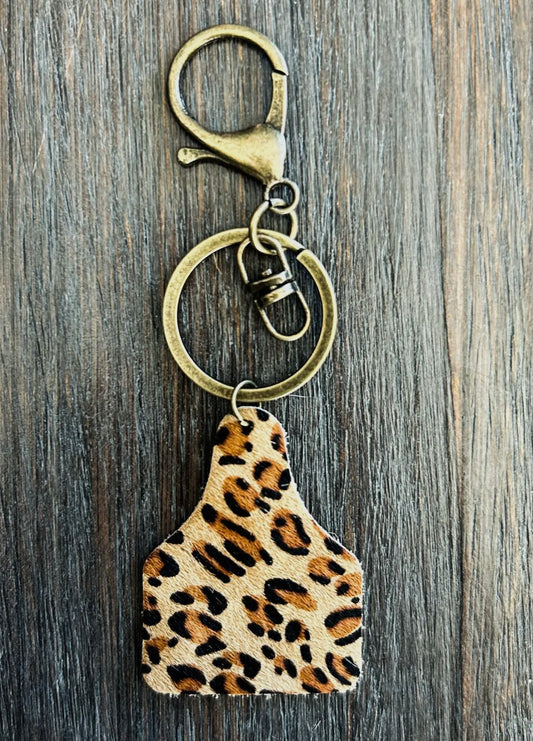 cow tag keychain, tan cheetah