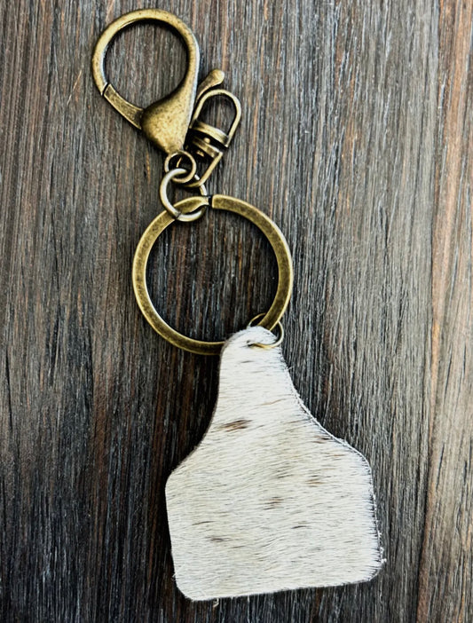 cow tag keychain, white with brown