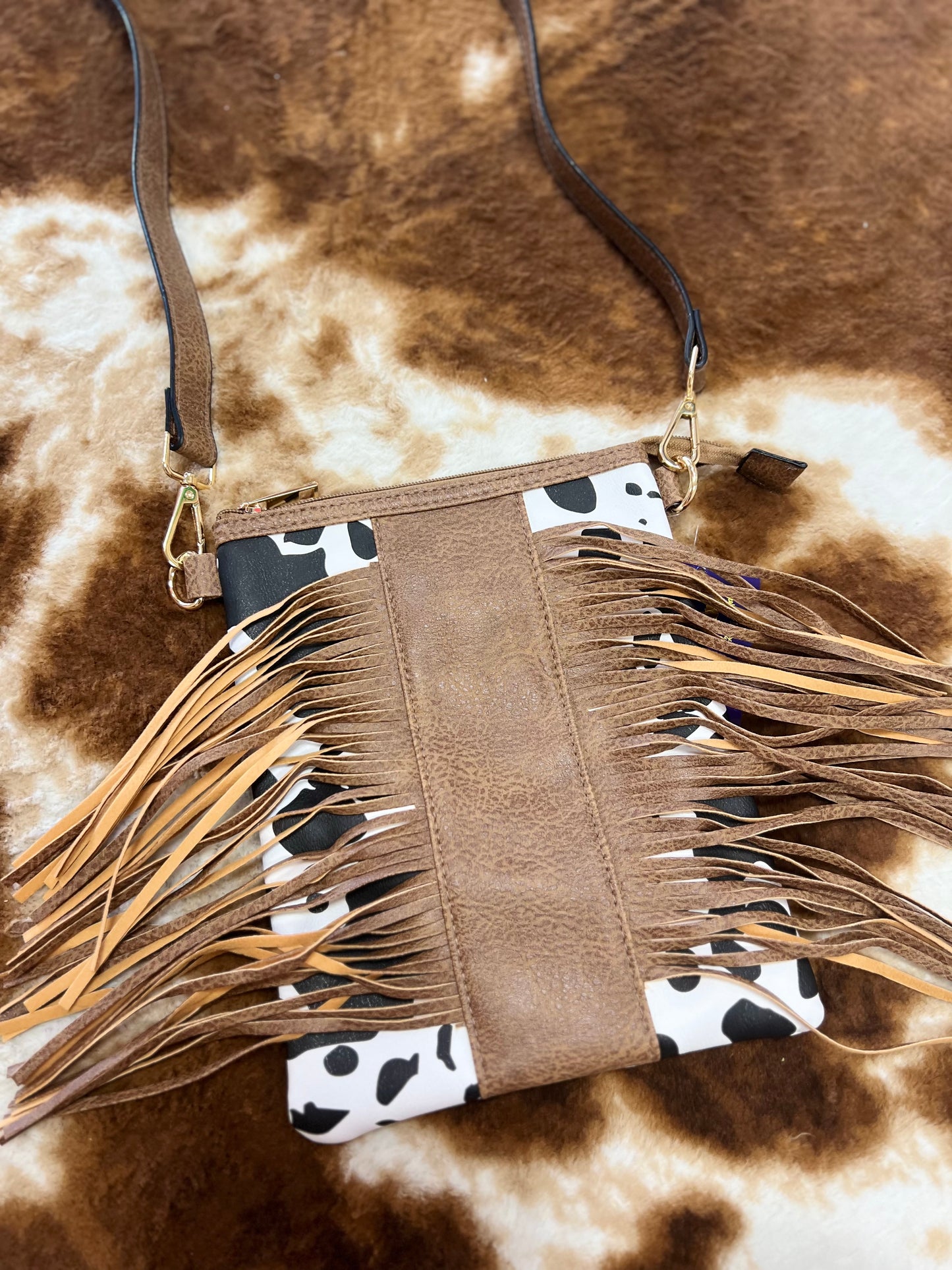 cow fringe crossbody